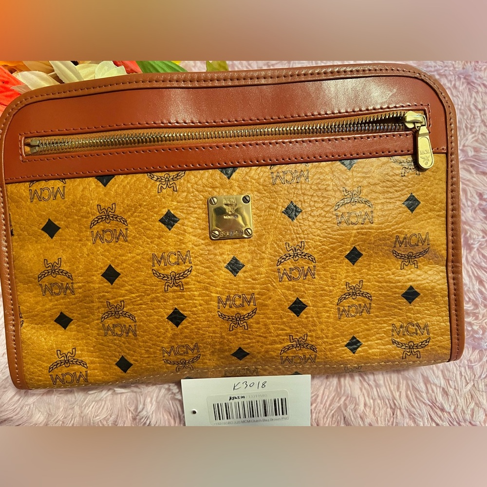 MCM COGNAC CLASSIC MONOGRAM LARGE CLUTCH /TOILETRY/MAKEUP BAG
RETAIL $548.00